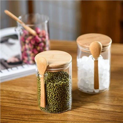 Rundes Vorratsglas mit Bambusdeckeln und Löffel